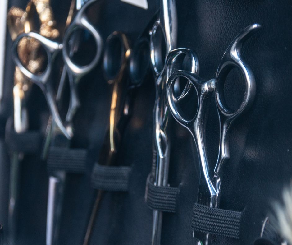 Close up of hairdressing and barbering scissors being stored in a case
